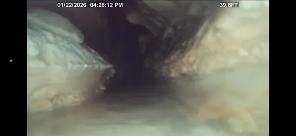 Sewer inspection camera footage of the inside of a drain pipe